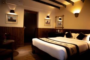 Katil atau katil-katil dalam bilik di Hotel Yechu