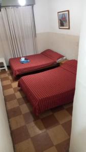 Postel nebo postele na pokoji v ubytování Hotel Florentino