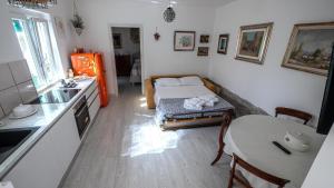 Кровать или кровати в номере Marty's House