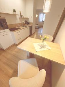 Kuchyňa alebo kuchynka v ubytovaní Trio Apartments