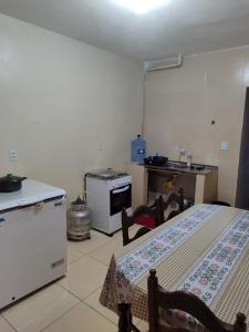 Dapur atau dapur kecil di Apê perto do Parque Euclides Dourado