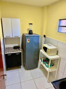 Η κουζίνα ή μικρή κουζίνα στο Casa mobiliada em gravatá