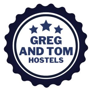 a logo for green and town hospitals at Greg&Tom Hostel in Kraków