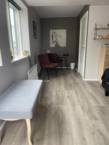Uma área de estar em Hildibrand Apartment Hotel