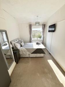 Postel nebo postele na pokoji v ubytování Westbridgeford Luxury Apartments + 6 fotografií