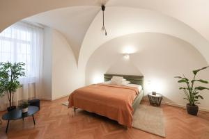 Posteľ alebo postele v izbe v ubytovaní U Kapra Apartments + 37 fotografií