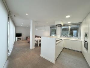 Kuchyň nebo kuchyňský kout v ubytování Casa Corrubedo