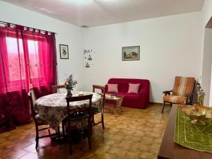 Posezení v ubytování Casa Vacanze La Farfalla di Vittori Fabiola + 16 fotografií