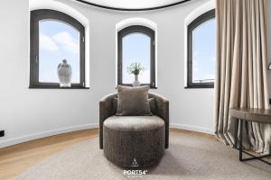 Posezení v ubytování Upper East Penthouse List auf Sylt + 33 fotografií