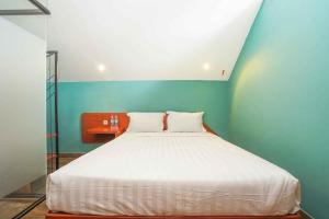 Voodi või voodid majutusasutuse Noesa Heritage toas