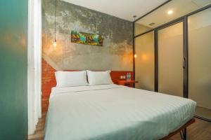 Voodi või voodid majutusasutuse Noesa Heritage toas +23 fotot