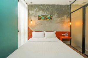 Voodi või voodid majutusasutuse Noesa Heritage toas