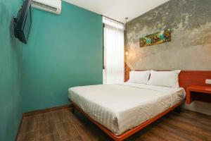 Voodi või voodid majutusasutuse Noesa Heritage toas