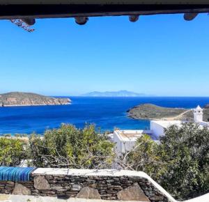a view of the ocean from a house at Maridina House in Livadi +13 photos