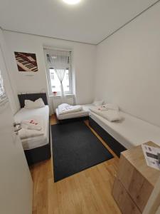 Postel nebo postele na pokoji v ubytování ABAI Apartments 1140 only WWW-On-line-Check-in & SelfService