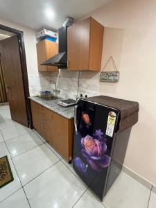 Η κουζίνα ή μικρή κουζίνα στο Cozy 1 BHK By Regal Homes