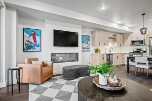 a living room with a couch and a dining room at Escape to Eden at the Pointe Pt C103 Wkly Discnt in Eden