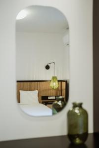 Postel nebo postele na pokoji v ubytování iKu Urban Apartment