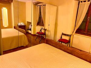 Кровать или кровати в номере La Casa dei Fieschi