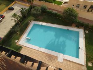an overhead view of a swimming pool in a yard at Concordia in Roquetas de Mar