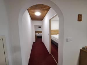 Postel nebo postele na pokoji v ubytování Penzion U Cyrila