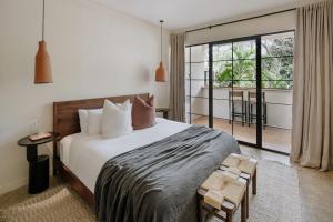 Voodi või voodid majutusasutuse Sendero Hotel toas