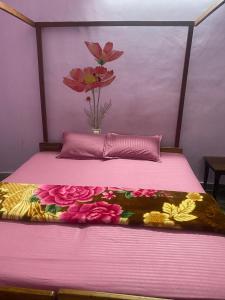 Voodi või voodid majutusasutuse Sudheendram North Cliff Sea View Beach Resort toas