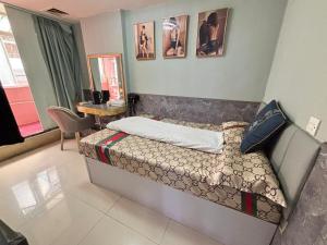 Ένα ή περισσότερα κρεβάτια σε δωμάτιο στο Mabo hotel