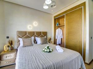 Ένα ή περισσότερα κρεβάτια σε δωμάτιο στο Luxury Apartment Vacation Agadir 10 +15 φωτογραφίες
