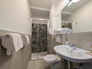 Koupelna v ubytování Hotel Piccolo
