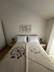 Postel nebo postele na pokoji v ubytování Apartment Pirun