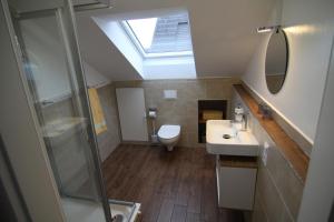 Koupelna v ubytování Gemütlich-moderne Ferienwohnung in ruhiger Lage