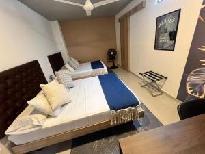 Postel nebo postele na pokoji v ubytování Star AV 37 HOTEL