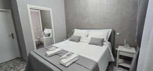 Postel nebo postele na pokoji v ubytování HOTEL PARADISO