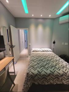 Postel nebo postele na pokoji v ubytování Espaço Maracanã + 33 fotografií