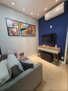 TV a/nebo společenská místnost v ubytování Espaço Maracanã