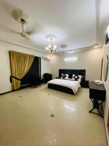 Ένα ή περισσότερα κρεβάτια σε δωμάτιο στο The Family Star Guest House