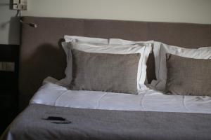 Postel nebo postele na pokoji v ubytování Michaelson Boutique Hotel & SPA Brícoła