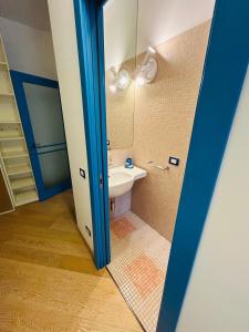a bathroom with a sink and a mirror at Grazia Luxury Home in Verona +50 photos