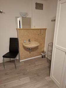 Koupelna v ubytování Hotel Garni Krone
