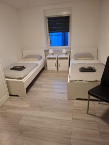 Postel nebo postele na pokoji v ubytování Hotel Garni Krone