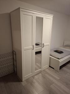 Postel nebo postele na pokoji v ubytování Hotel Garni Krone