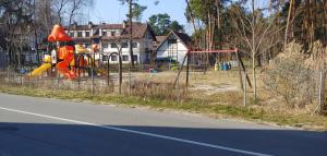 Area giochi per bambini di Dom Kotik w Łukęcinie