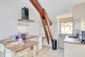 Η κουζίνα ή μικρή κουζίνα στο Le charmant - T3 - Montluel