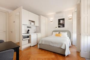 Η κουζίνα ή μικρή κουζίνα στο CASA JOY Boavista apartment