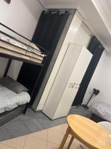Ένα ή περισσότερα κρεβάτια σε δωμάτιο στο Plaza Mayor GuestHouse