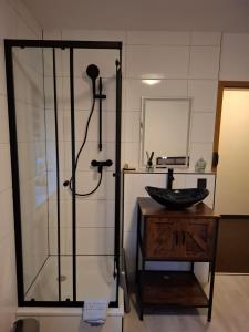 Koupelna v ubytování Hotel Garni Krone