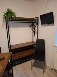 TV a/nebo společenská místnost v ubytování Hotel Garni Krone