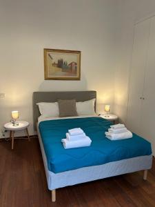 Postel nebo postele na pokoji v ubytování Cavour 142 Rooms