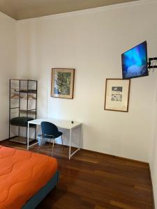TV a/nebo společenská místnost v ubytování Cavour 142 Rooms + 17 fotografií
